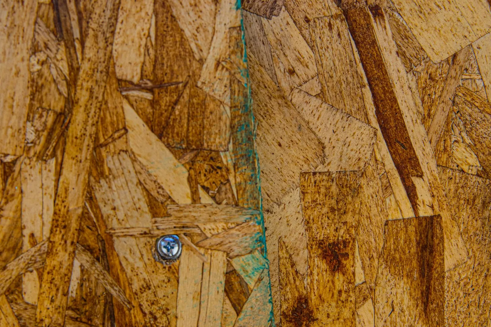 Sheet plywood cut ready to board over an opening
