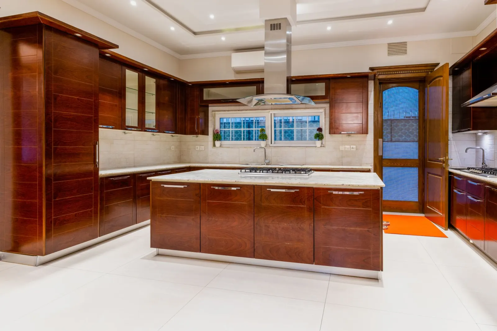A fitted kitchen with run of base and wall units installed